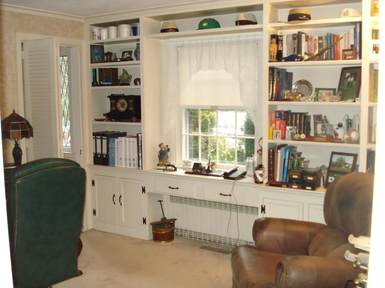 Painted bookcase and millwork before painting